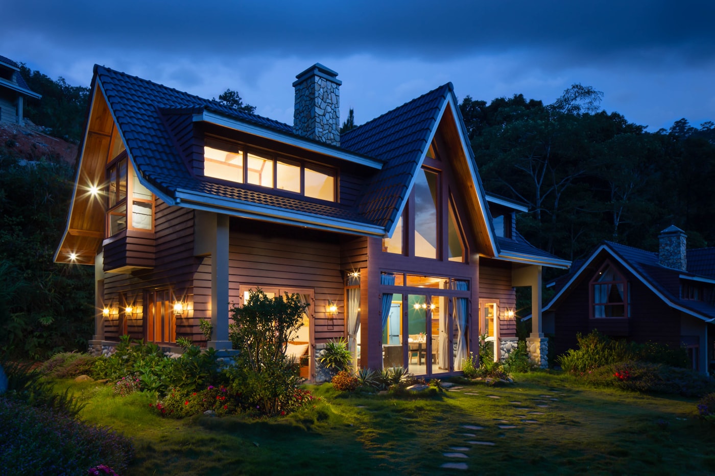 A warmly lit, energy-efficient Solihull home at dusk